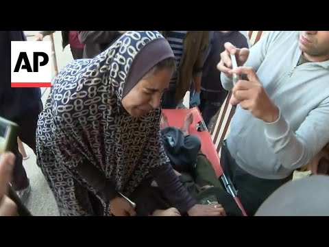 Distraught mother accompanies remains of young sons killed in Israeli airstrike in Gaza [Video]