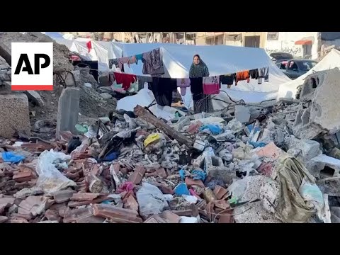 Displaced residents relocate to Gaza City and live in tents among piles of rubbish and rubble [Video]