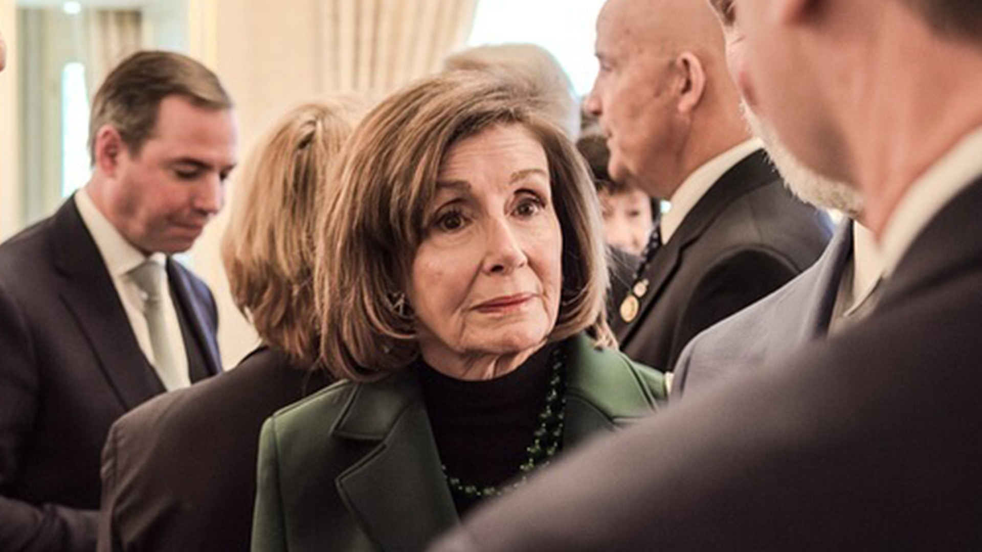 Nancy Pelosi, 84, seen clinging to lawmaker before she ‘fell down marble stairs, fractured hip’ & was rushed to hospital [Video]