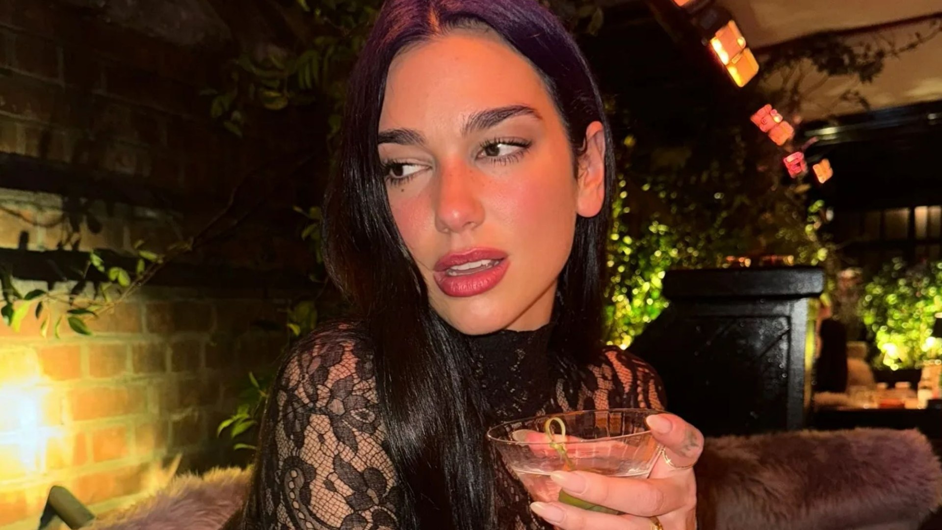 Dua Lipa shows off huge engagement ring and looks incredible in see-through lace outfit after Callum Turner’s proposal [Video]