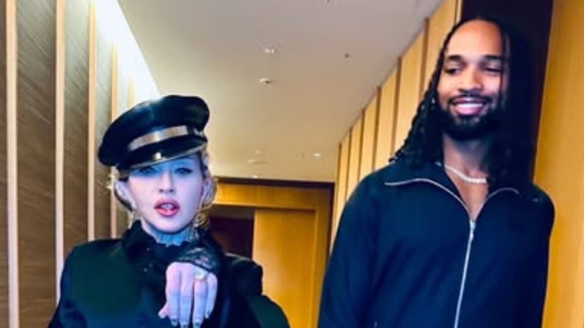 Madonna,66, fuels engagement rumors with Akeem Morris, 28, while flashing diamond ring on THAT finger [Video]