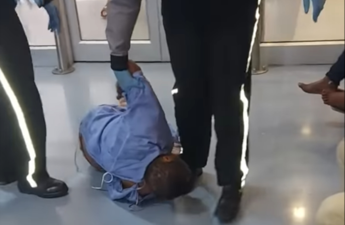 Guards suspended for dragging patient through hospital [Video]